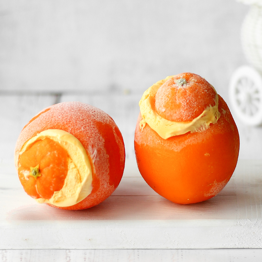 Апельсиновый замороженный десерт в оболочке натурального апельсина. изображение 1