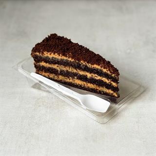 Сочный торт из слоев насыщенного шоколадного бисквита с грецким орехом и крема на основе варёной сгущёнки.