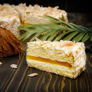 Изысканный торт из слоев кокосового бисквита, крема на основе белого шоколада, взбитых сливок и сочного слоя ананасового конфитюра с кусочками ананаса. Сверху торт украшен обжаренным кокосовым кранчем.